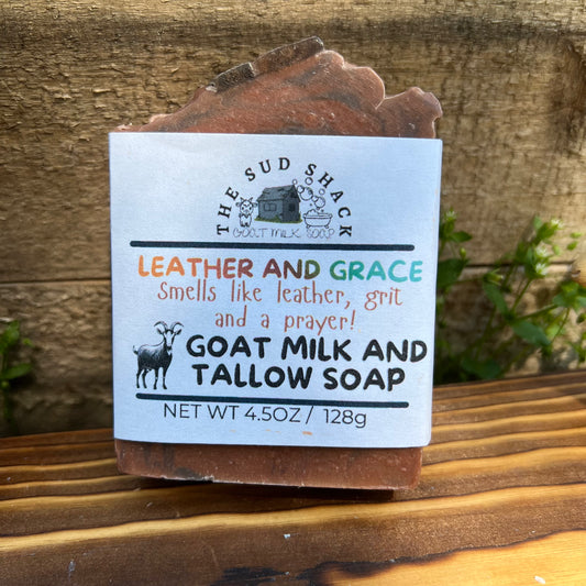 Bar of soap with a label on a wooden surface