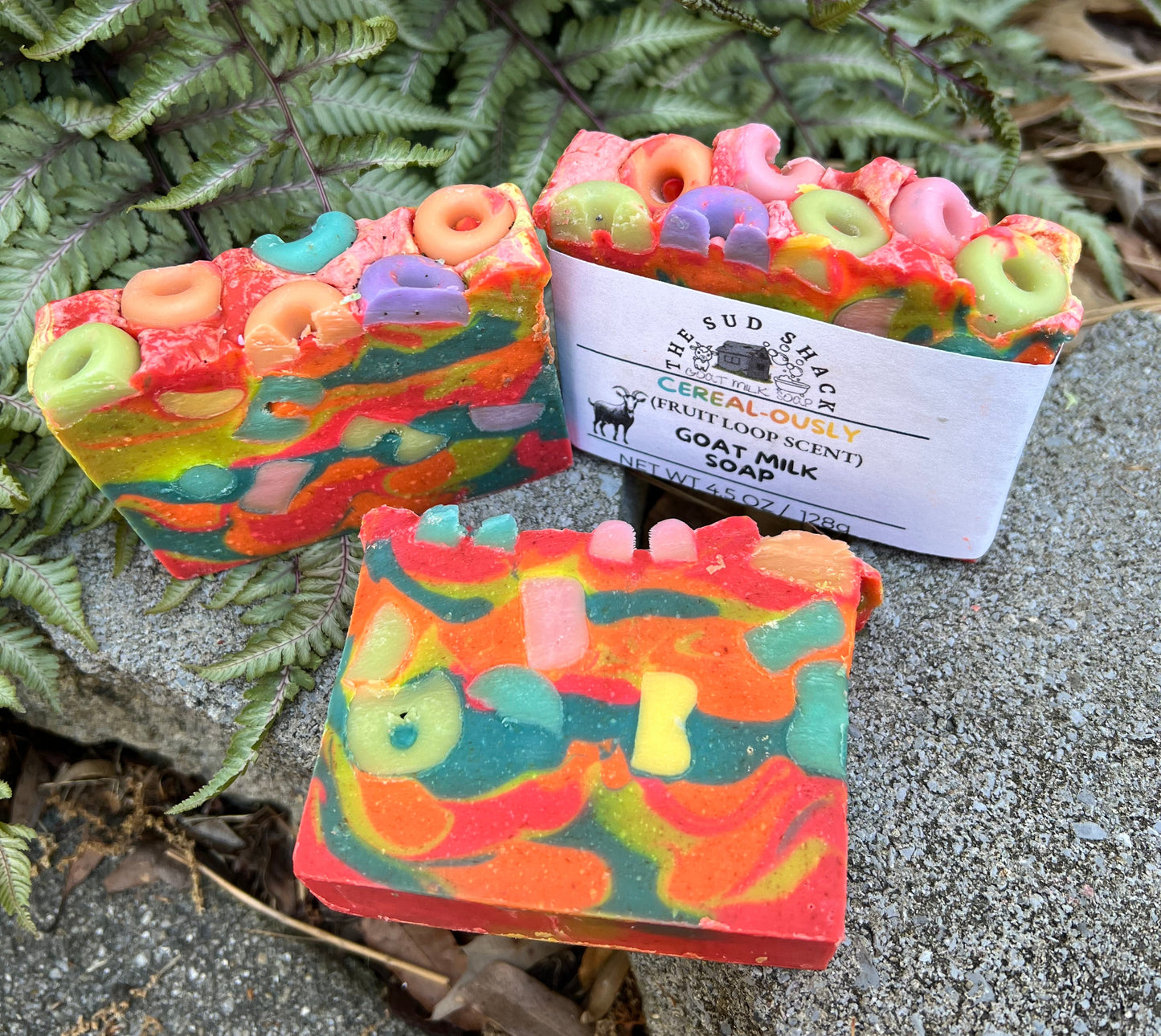 Colorful soap bar with a business card on a natural background