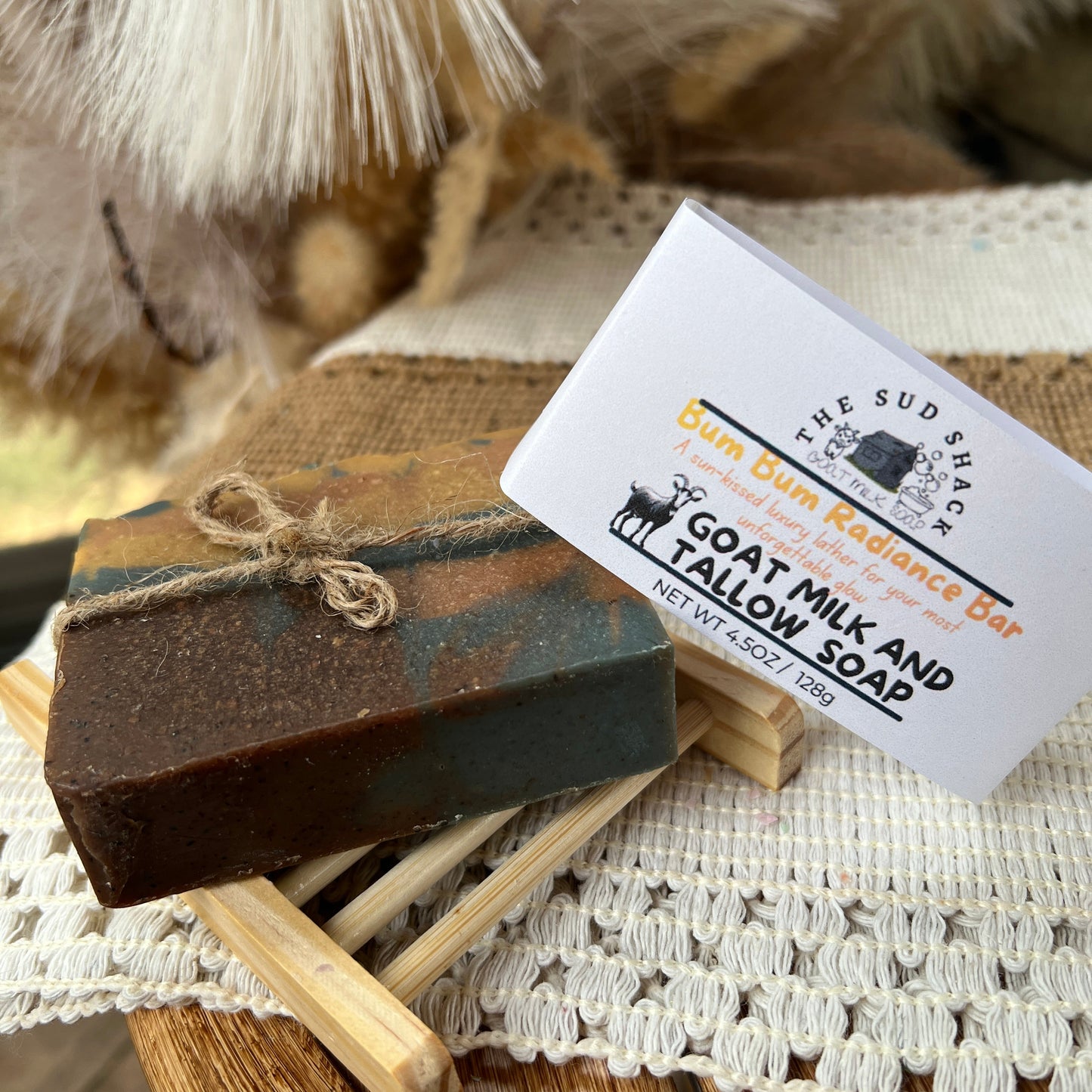 Bar of soap with a label on a textured surface