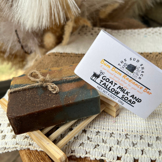 Bar of soap with a label on a textured surface